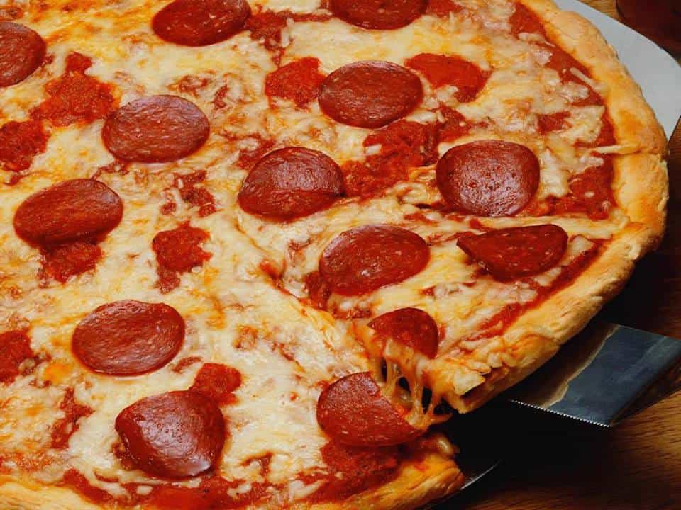 Nos pizzas artisanales préparées avec des produits frais